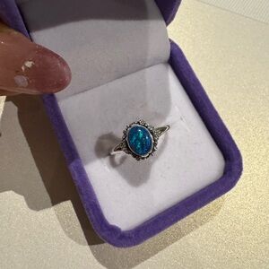 Australian opal stone on 925 silver setting

Adjustable